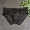 Summer Men's Black Swimwear Mesh Sexy Mesh lateral Biquíni Piscina Briefs com/sem esponja Pad Low Waist Solid Patchwork Bequine 220505