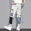 メンズパンツカジュアルメンカーゴマルチポケットミックスカラー日本のファッションストリートウェアオスの春と夏のスポーツ屋外作業ズボン