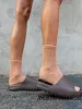 Designerskie kapcie mężczyźni kobiety zjeżdżają buty domowe letnie oszumy miękkie domki kapcie plażowe unisex poduszki slajdy