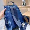 Zaino alla moda Borsa da scuola di design Zaini da donna Cartelle da uomo Zaino di grande capacità Borsa a tracolla in nylon Borsa a tracolla