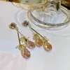 Balancent lustre Vintage cristal Simple épissage fleur longues boucles d'oreilles pour femmes bijoux en métal Oorbellen cadeau