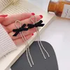 Clip-on schroef terug CM Koreaanse zwarte boog lange clip op oorbellen niet-piercing temperament luxe shinny strass tassel oor oorbellenclip-on-on