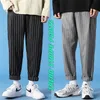 Японские полосы брюки мужские моды модные модные повседневные мужчины уличная одежда дикие свободные шнурки мужские черные брюки плед 220325