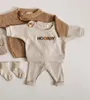 Модная детская одежда набор малыша для малыша для мальчика для девочек рисунок повседневные топы детские брюки 2pcs дизайнерская одежда 220808