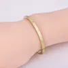 Brazalete Clásico Modelo pequeño Brazalete delgado Amor Pulseras Brazaletes para mujeres Hombres Joyas de diseño de acero de titanio con llave Destornillador Diseño de inscripción