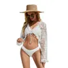 Costumi da bagno da donna Donna Manica lunga Coprispalle Crop Top Sexy Bikini in pizzo floreale velato Cover Up Lace-Up Ruffles irregolari Cardigan aperto sul davantiDonna