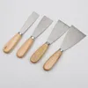 En gros en acier inoxydable deux couleurs poignée mastic lot couteau manche en bois double clip miroir poli spatule