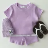 Kläder sätter 2st babykläder sommar kortärmad solid kostymer barn t-shirt shorts för barn pojkar flicka utan hatt och skor klädsel