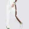 Pantaloni a due pezzi da donna Temperamento alla moda Invecchiamento Tuta sportiva bianca 2022 Giacca con colletto alla coreana primavera Set casual a due pezzi