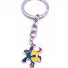 Whole 20pcs10pcs lot Enamel Rhinestone Autism Awareness Jigsaw Puzzle Piece Charm Keychain Keyring For Man Woman Gifts3299084