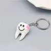 Dental Zahn Form Modell Schlüsselbund Mode Schlüsselring Cartoon Mädchen Geschenk Tasche Anhänger Zähne Auto Schlüssel Kette Schmuckstücke 2021 Neue Trend g220421