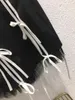 التنانير في صيف 2022 bindind bowknot خياطة صافي الغزل تظهر رقيقة نصف طول تنورة طويل القامة الخصر كلمة 0823