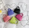 Moda bambini borsa a conchiglia per bambini PU Borse a tracolla in pelle con catena per ragazze borsa principessa a spalla singola color caramella