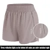 Kvinnors shorts Löst sida blixtlåsficka Fashion Print Gym Yoga Träning som kör utomhus lätt andningsbar kort 220509