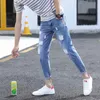 Jeans masculinos Primavera e verão 2022Fashion adolescente Ripped Men Trendy Brand Thin Casual Slimt-Fiting Long Pants For Students Pencil