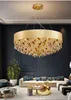Nuovo lampadario da soggiorno lampada dal design moderno, lampada a sospensione in oro, lampada di cristallo a led di lusso rotonda per camera da letto