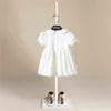 Neue Mädchen Kleider Kleider Sommerkleider Kidsshort Ärmel süßes weißes Druck o-Neck A-Line Kleid Sommerprinzessin Kleider für Mädchen G220506