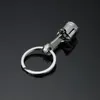 Presentes promocionais por atacado Pistão de metal de metal prateado keychain mecanismo keyfob motor fob chave de anel de corrente anéis de376