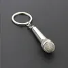 Novel Metal Microphone Keychains Ny designmikrofonnyckel kan med en anteckning inuti