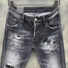 Jeans pour hommes hommes lettre imprimé maigre avec des trous déchirés peinture élastique coutures en aérosol mendiant pantalon 9121 # hommes
