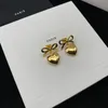 Designer Bow Tie Silver Earrings Stud voor dames goud oorbel mode luxe oorbellen sieraden vrouwen heren hoepel oorrel 2208082d