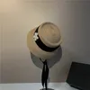 Protezione solare da donna Cappelli di paglia Fiore di perle Streamer Design Cappello superiore concavo Cappello da sole da viaggio primaverile ed estivo