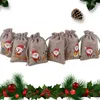クリスマスの装飾5pcs/セットグッズバッグドローストリングダスト証明模倣リネン小さなジュート黄麻布テーマ印刷キャンディーポーチパーティーサプライ