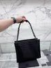 Alışveriş çantası tasarımcı çanta kadın alışveriş çantası tek omuzlu portatif siyah büyük kapasiteli deri rahat fermuarlı cep