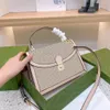 Bolso de cuero de alta calidad Marca de lujo con asa Bolsos de hombro para mujer Bolso cuadrado pequeño Sac A Main