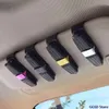 sun visor eyeglass holder