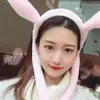 Cute Plush Bunny Ear Move Headband Easter Rabbit Ears Popping Up Pressing the Paws Fluffy Funny Flag Headband for kids souvenir