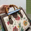 Diana bambusowa torba płótno torba na zakupy torby plażowe torebki Design Flower Crossbody Torby na ramię skórzana torebka Klasyczna kwadratowa torba posłańca czerwony zielony pasek