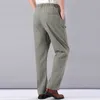 Pantaloni a vita alta da uomo Pantaloni estivi Abbigliamento Novità Lino Cotone sciolto Fascia elastica Lavoro sottile Gambe larghe vintage 220323