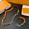 Lancé dans Luxury Splicing Necklace Bracelet chaîne designer à la mode coloré marque Collier LOGO lettres pour hommes et femmes Festival cadeaux