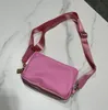 Mycket söt svart mini plånbok mynt purses varumärke nyckel kedja plånböcker toppklass Nylon canvas nyckelpåse män kvinnor blixtnedgång modekorthållare förvaringspåsar