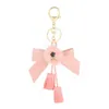 Keychains Número 5 Pingente de bolsa Camellia para mulher Jóias de luxo Bow Keyring Bowknot Pearl DecorationKeyChains