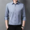 Heren jurts shirts heren zakelijk shirt solide kleur mode casual slanke witte lange mouw mannelijk merk kleding elastische anti-rimpel niet-ijzer