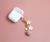 Keychains Cute Romantic Flower Sakura Fur Ball Gold Metal Letter Trinket Key Chains Car Bag Pendent Charm AirPods Accessories D377 Enek22