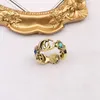 Najwyższej jakości 18-karatowe złoto platowane marka pasmo listowe dla męskich damskich projektantów mody litery marki Turquoise Crystal Metal Daisy Ring Jewelry One Rozmiar