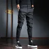 Pantaloni casual da uomo Streetwear coreano Pantaloni slim fit elasticizzati neri 220330