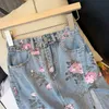 Nya kvinnor retro denim jeans tryck blommor mode sida vent Jag midi lång kjol plus storlek smlxlxxl3xl4xl5xl