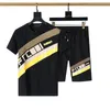 メンズトラックスーツツーピース半袖と縞模様の刺繍ファッションスタイル春夏の通気性スポーツスーツTシャツセット
