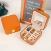 Travel Jewelry Boxes PU Leather Organizer with Mirror Small Portable Jewelry Box for Rings Earrings Necklaces Bracelet Display Storage Cases