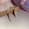 Luxury Luxury Square Crystal Drop Penrings for Women Brilliant Gold Color Joya de boda nupcial Pendientes colgantes GC1156