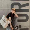 여성을위한 고급 디자이너 패션 핸드백 대용량 캔버스 숄더 가방 소녀 쇼핑 토트 가방 학생 학교 A4 책 가방 G220524