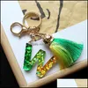 Nyckelringar smycken anpassad nyckelring nyckelring initial bokstav A-Z nummer 0-9 Tassel Pendant Bag Charms Tillbehör Fashion Presentbilskedjor Ring