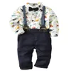 Nyfödda Baby Boys Kläder Sätta Dinosaurier Skriv ut Långärmad Top Romper + Suspender Byxor + Båge Barn Barn Spädbarn Kläder