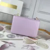 Top women's designer leather cosmetic bag fashion metal buckle beauty chain bag luxury display party messenger bags 303 24X16 * 7cm