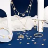 Hangende kettingen kissitty 84pcs gemengde vorm goud kleur messing hangers langdurige vergulde charmes voor ketting oorbellen armband sieraden mak