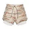 Verão reto como shorts masculinos de tamanho solto capris reto Cappris Trendy Multi Pocket Double Cayer calça casual Design listrado de alta qualidade de alta qualidade